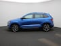 Skoda Karoq 1.5 TSI ACT Sportline Business AUTOMAAT | PANO-SCHUIFDAK | STOEL-STUURWIELVERWARMING | TREKHAAK | CAMERA | NAVIGATIE | VIRTUAL COCKPIT | CANTON AUDIO