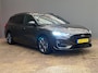 Ford Focus Wagon 1.0 EcoBoost Hybrid ST Line | Trekhaak | Stoel/stuur/voorruit verwarming | Cruise adaptief | Dodehoek detectie | Camera | Apple Carplay/Android Auto | Achteruitrijcamera | Apple Carplay/Android Auto|telefoonintegratie premium | Cruise control adaptief met Stop&Go en stuurhulp