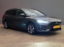 Ford Focus Wagon 1.0 EcoBoost Hybrid ST Line | Trekhaak | Stoel/stuur/voorruit verwarming | Cruise adaptief | Dodehoek detectie | Camera | Apple Carplay/Android Auto | Apple Carplay/Android Auto|telefoonintegratie premium | Cruise control adaptief met Stop&Go en stuurhulp | Dodehoek detectie