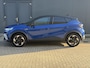Renault Captur 1.6 E-Tech full hybrid 145 esprit Alpine Automaat / Fabrieksgarantie tot 07-2027 < 100.000 km** / Schuifdak / Camera 360° /Stuur-, stoel- en voorruitverwarming / Adaptieve CC / Parkeer assistent / Navigatie / Apple Carplay Android / LM 18" wielen / 18" LM wielen met All Season banden /