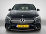 Mercedes-Benz B-klasse 180 Business Solution AMG | Trekhaak | Parkeerpakket met Camera | Car Play | Stoelverwarming | LED | Cruise Controle | Inclusief 24 maanden Mercedes-Benz Certified garantie voor Europa.