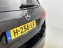 Mercedes-Benz B-klasse 180 Business Solution AMG | Trekhaak | Parkeerpakket met Camera | Car Play | Stoelverwarming | LED | Cruise Controle | Inclusief 24 maanden Mercedes-Benz Certified garantie voor Europa.