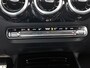Mercedes-Benz B-klasse 180 Business Solution AMG | Trekhaak | Parkeerpakket met Camera | Car Play | Stoelverwarming | LED | Cruise Controle | Inclusief 24 maanden Mercedes-Benz Certified garantie voor Europa.
