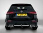 Mercedes-Benz B-klasse 180 Business Solution AMG | Trekhaak | Parkeerpakket met Camera | Car Play | Stoelverwarming | LED | Cruise Controle | Inclusief 24 maanden Mercedes-Benz Certified garantie voor Europa.