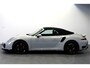 Porsche 911 Cabrio 3.8 Turbo 441kW/600pk PDK7 NL-AUTO!! AKRAPOVIC COMPLEET + SPORT CHRONO + PDLS PLUS + KEYLESS DRIVE + PASM + CAMERA + STOELVERWARMING&-VENTILATIE + BOSE SOUND + TARGET BLUEYE + MOSHAMMER SPOILERPAKKET + PARKSENSOREN V&A + 20" VOSSEN LM-VELGEN!