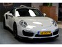 Porsche 911 Cabrio 3.8 Turbo 441kW/600pk PDK7 NL-AUTO!! AKRAPOVIC COMPLEET + SPORT CHRONO + PDLS PLUS + KEYLESS DRIVE + PASM + CAMERA + STOELVERWARMING&-VENTILATIE + BOSE SOUND + TARGET BLUEYE + MOSHAMMER SPOILERPAKKET + PARKSENSOREN V&A + 20" VOSSEN LM-VELGEN!