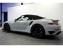 Porsche 911 Cabrio 3.8 Turbo 441kW/600pk PDK7 NL-AUTO!! AKRAPOVIC COMPLEET + SPORT CHRONO + PDLS PLUS + KEYLESS DRIVE + PASM + CAMERA + STOELVERWARMING&-VENTILATIE + BOSE SOUND + TARGET BLUEYE + MOSHAMMER SPOILERPAKKET + PARKSENSOREN V&A + 20" VOSSEN LM-VELGEN!