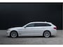 BMW 5-Serie Touring 520e High Executive - Laser - Memory - HUD - Achteras besturing - Stoel/Stuur verwarming - ACC - Keyless - Rijklaar