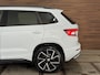 Skoda Karoq 1.5 TSI DSG 4x4 Sportline Business | 1800KG Trekgewicht | Carplay | Sportstoelen | Camera