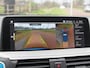 BMW iX3 High Executive 80 kWh | Panoramadak | 360 Camera | Trekhaak | Sfeerverlichting | Head-Up Display | Harman Kardon |
