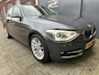 BMW 1-Serie 114i Business+ Sportline Xenon | PDC | Sportstoelen | Leder | Navi | Trekhaak |