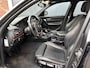 BMW 1-Serie 114i Business+ Sportline Xenon | PDC | Sportstoelen | Leder | Navi | Trekhaak |