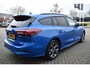 Ford Focus Wagon 1.0 EcoBoost Hybrid ST Line X | Climate Control | Adaptieve Cruise Control | Achteruirijcamera | Dode Hoek Detectie | Winterpakket | Bang & Olufsen Premium Geluidsysteem | "Lederen Bekleding" | Elektrisch Bedienbare Achterklep | Apple Carplay/Android Auto |