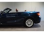 BMW 2-Serie 220i Cabrio Luxury Line | PDC | Xenon | Navigatie | Midnight Blue metallic |
