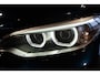 BMW 2-Serie 220i Cabrio Luxury Line | PDC | Xenon | Navigatie | Midnight Blue metallic |