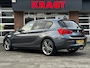 BMW 1-Serie Sportline 118i 136 pk - Automaat - LED - afn. Trekhaak - Sportstoelen