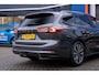 Ford Focus Wagon 1.0 EcoBoost Hybrid Titanium X | | Trekhaak | Cruise adaptief | Camera | Stuur/stoel/voorruit verwarming | Dodehoek detectie | Apple Carplay/Android Auto | Achteruitrijcamera | Apple Carplay/Android Auto|telefoonintegratie premium | Cruise control adaptief met Stop&Go en stuurhulp