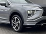 Mitsubishi Eclipse Cross 2.4 PLUG-IN HYBRID 4WD S-AWC Executive Automaat / Fabrieksgarantie tot 12-2030 / Trekhaak 1.500 kg / Leder / Elektrische stoelen / Navigatie / Stuur-, stoel - & achterbankverwarming / HUD / Camera 360° / 18" LM wielen + All Season banden /