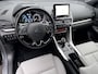Mitsubishi Eclipse Cross 2.4 PLUG-IN HYBRID 4WD S-AWC Executive Automaat / Fabrieksgarantie tot 12-2030 / Trekhaak 1.500 kg / Leder / Elektrische stoelen / Navigatie / Stuur-, stoel - & achterbankverwarming / HUD / Camera 360° / 18" LM wielen + All Season banden /