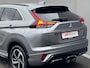 Mitsubishi Eclipse Cross 2.4 PLUG-IN HYBRID 4WD S-AWC Executive Automaat / Fabrieksgarantie tot 12-2030 / Trekhaak 1.500 kg / Leder / Elektrische stoelen / Navigatie / Stuur-, stoel - & achterbankverwarming / HUD / Camera 360° / 18" LM wielen + All Season banden /