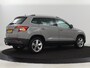Skoda Karoq 1.0 TSI Ambition Business | Stoelverwarming | Trekhaak | Carplay | Navigatie | Parkeerhulp | Climate control | Chroom delen | DAB | Getint glas | Cruise control
