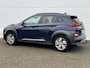 Hyundai Kona Electric EV Limited 64 kWh / Trekhaak / Cruise control adaptief met Stop&Go en stuurhulp / Achterbank verwarmd /