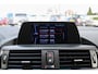 BMW 1-Serie 114i Business+ NAVIGATIE/ LEDER/ LM 17/ PDC