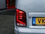 Volkswagen Transporter 2.0 TDI L2H1 32 DC Bulli | Trekhaak | Glasslook | Camera | Navigatie | Airco | Adaptieve Cruise Control | LED Koplampen | Vloerplaat | Wandbekleding | Sidebars | Metallic Lak | Parkeersensoren | Virtual Cockpit | Bluetooth | Apple Carplay | Android Auto | Discovery Pro |