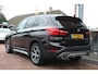 BMW X1 (f48) sDrive20i Aut *Orange Edition* | Trekhaak | Cruise & Climate Control | Camera | Stoel verwarming | Navigatie | Leder | Privacy | PDC | Orig.NL |