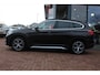 BMW X1 (f48) sDrive20i Aut *Orange Edition* | Trekhaak | Cruise & Climate Control | Camera | Stoel verwarming | Navigatie | Leder | Privacy | PDC | Orig.NL |
