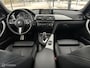 BMW 3-Serie Touring 320i M Sport High Executive PANO/NAP/LED