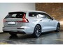 Volvo V60 T6 Plug-in hybrid AWD Essential Bright | Lederen bekleding | Electrische wegklapbare trekhaak | Stoelverwarming | Adaptive cruise Control | Parkeersensoren voor + achter | Parkeercamera | BLIS | Stuurwielverwarming