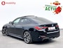 BMW i4 M50 544Pk High Executive 84 kWh Elektrisch verstelbare stoelen | Trekhaak 1600kg | Schuif/Kanteldak | Driving Assistant Professional | Harman Kardon Sound System | Head Up Display | Verwarmbaar stuurwiel | Interieurlijsten Carbon Fibre | Parking Assist.
