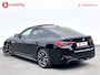 BMW i4 M50 544Pk High Executive 84 kWh Elektrisch verstelbare stoelen | Trekhaak 1600kg | Schuif/Kanteldak | Driving Assistant Professional | Harman Kardon Sound System | Head Up Display | Verwarmbaar stuurwiel | Interieurlijsten Carbon Fibre | Parking Assist.