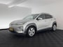 Hyundai Kona Electric EV Fashion 64 kWh (3-Fase) {SOH-100%} (INCL-BTW) Aut * HEATPUMP | NAVI-FULLMAP | LEATHER-FABRIC | KEYLESS | CAMERA | DAB | ECC | PDC | ADAPTIVE-CRUISE | LANE-ASSIST | HEATED SEATS | PRIVACY-GLASS | HEAD-UP | SHIFT-PADDLES | 17"A