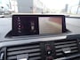 BMW 1-Serie M140i xDrive High Executive HARMAN/KARDON | ACHTERUIT RIJ CAMERA | NAVIGATIE | SFEERVERLICHTING | HARMANKARDON | F1 STUUR | LEDER | ELEKTRISCHE STOELEN MEMORY |