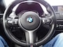 BMW 1-Serie M140i xDrive High Executive HARMAN/KARDON | ACHTERUIT RIJ CAMERA | NAVIGATIE | SFEERVERLICHTING | HARMANKARDON | F1 STUUR | LEDER | ELEKTRISCHE STOELEN MEMORY |