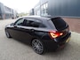 BMW 1-Serie M140i xDrive High Executive HARMAN/KARDON | ACHTERUIT RIJ CAMERA | NAVIGATIE | SFEERVERLICHTING | HARMANKARDON | F1 STUUR | LEDER | ELEKTRISCHE STOELEN MEMORY |