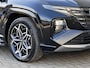 Hyundai Tucson 1.6 T-GDI HEV 230pk N Line Sky Fabrieksgarantie tot 04-2029 / Dealer onderhouden / 1.650kg Trekgewicht / Panorama schuifdak / Stuur-, stoel- en achterbankverwarming / Apple Carplay Android / 19" LM wielen /