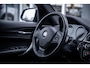 BMW 1-Serie 118i AUT8 High-Executive I Leder I Trekhaak I Stoelverw. I 18'' I LED