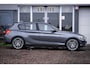 BMW 1-Serie 118i AUT8 High-Executive I Leder I Trekhaak I Stoelverw. I 18'' I LED