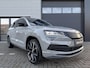 Skoda Karoq 1.5 TSI ACT Sportline Business 150PK ✓Virtual Cockpit ✓Full LED ✓Navigatie Full Map ✓Camera  ✓Apple Carplay & Android Auto ✓Climate ✓Cruise ✓Stoel- stuurverwarming ✓Parkeersensoren ✓Trekhaak ✓Lichtmetaal 19