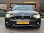 BMW 1-Serie 114i Business+ Leder Navi Parkeersensoren Mistlampen Cruise control 16"L.M.
