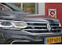 Volkswagen Tiguan 1.4 TSI 245PK eHybrid R-LINE BUSINESS + | BEKLEDING LEDER VIENNA | PANORAMISCH SCHUIF/KANTEL DAK | ELEKTRISCH WEGKLAPENBARE TREKHAAK | R-LINE INTERIEUR/EXTERIEUR | VERWARMBARE VOORSTOELEN/STUUR | ELEKTRISCH BEDIENBARE VOORSTOELEN MET GEHEUGEN FUNCTIE | AKOESTISCH GLAS GETINT | KEYLESS ACCESS/START | ELEKTRISCH BEDIENABRE ACHTERKLEP | DAKSPOILER R-LINE | SFEER VERLICHTING | RIJASSISTENT PAKKET O.A. LANE ASSIST EN ADAPTIVE CRUISE CONTROL EN DODEHOEK DETECTIE | NAVIGATIE | APPLE CARPLAY/ANDROID AUTO | DAB+ RADIO | LED MATRIX KOPLAMPEN (IQ LIGHT) | DRAADLOZE TELEFOONLADER | DIGITAAL DASHBOARD | 360° CAMERA | CLIMA CONTROL VOOR EN ACHTERIN |