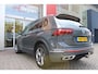 Volkswagen Tiguan 1.4 TSI 245PK eHybrid R-LINE BUSINESS + | BEKLEDING LEDER VIENNA | PANORAMISCH SCHUIF/KANTEL DAK | ELEKTRISCH WEGKLAPENBARE TREKHAAK | R-LINE INTERIEUR/EXTERIEUR | VERWARMBARE VOORSTOELEN/STUUR | ELEKTRISCH BEDIENBARE VOORSTOELEN MET GEHEUGEN FUNCTIE | AKOESTISCH GLAS GETINT | KEYLESS ACCESS/START | ELEKTRISCH BEDIENABRE ACHTERKLEP | DAKSPOILER R-LINE | SFEER VERLICHTING | RIJASSISTENT PAKKET O.A. LANE ASSIST EN ADAPTIVE CRUISE CONTROL EN DODEHOEK DETECTIE | NAVIGATIE | APPLE CARPLAY/ANDROID AUTO | DAB+ RADIO | LED MATRIX KOPLAMPEN (IQ LIGHT) | DRAADLOZE TELEFOONLADER | DIGITAAL DASHBOARD | 360° CAMERA | CLIMA CONTROL VOOR EN ACHTERIN |