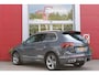 Volkswagen Tiguan 1.4 TSI 245PK eHybrid R-LINE BUSINESS + | BEKLEDING LEDER VIENNA | PANORAMISCH SCHUIF/KANTEL DAK | ELEKTRISCH WEGKLAPENBARE TREKHAAK | R-LINE INTERIEUR/EXTERIEUR | VERWARMBARE VOORSTOELEN/STUUR | ELEKTRISCH BEDIENBARE VOORSTOELEN MET GEHEUGEN FUNCTIE | AKOESTISCH GLAS GETINT | KEYLESS ACCESS/START | ELEKTRISCH BEDIENABRE ACHTERKLEP | DAKSPOILER R-LINE | SFEER VERLICHTING | RIJASSISTENT PAKKET O.A. LANE ASSIST EN ADAPTIVE CRUISE CONTROL EN DODEHOEK DETECTIE | NAVIGATIE | APPLE CARPLAY/ANDROID AUTO | DAB+ RADIO | LED MATRIX KOPLAMPEN (IQ LIGHT) | DRAADLOZE TELEFOONLADER | DIGITAAL DASHBOARD | 360° CAMERA | CLIMA CONTROL VOOR EN ACHTERIN |