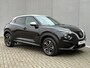 Nissan Juke 1.0 DIG-T N-Connecta Automaat / Fabrieksgarantie t/m 10-04-2028 / Cold Pack / Trekgewicht 1250 KG / all-season banden / Apple Carplay Android Auto / Stuur-, Stoel en Voorruit verwarming / Achteruitrijcamera / Keyless Entry/Start / Draadloze telefoon lader /