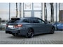 BMW 3-Serie Touring 320e Aut. M Sportpakket Pro | Panoramadak | 19" LM Velgen | Head-Up Display | Trekhaak | Leder | Achteruitrijcamera | HIFI |