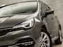 Opel Astra Sports Tourer 1.2 Elegance 146Pk (APPLE CARPLAY, GROOT NAVI, CLIMATE, CAMERA, LEDER, GETINT GLAS, SPORTSTOELEN, KEYLESS, LANE ASSIST, LED KOPLAMPEN, DAB+, LM VELGEN, NIEUWSTAAT)