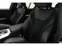 BMW 3-Serie 330e xDrive M Sport / M340i Diffuser / Black Diamond M Grill / M340i M Sport bumper pakket / Schuif-/kanteldak / Premium kleur Dravitgrau / Apple Carplay - Android Auto / Stoelverwarming / Ambienteverlichting / 19'' LMV / Stuurwiel verwarming / Full LED / Keyless / Koplamp BMW Individual Shadow Line / Draadloze telefoonlader / Active Cruise Control / Navigatie / DAB+